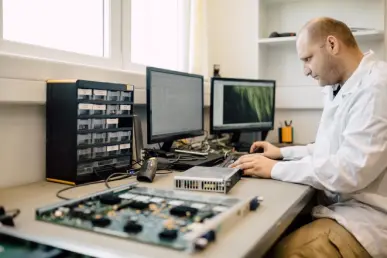 technician-repairing-cmts-cards-2021-08-26-17-29-5